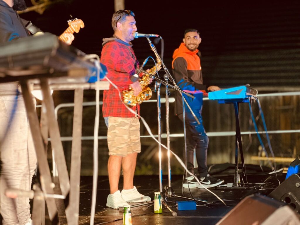 Band with saxophone and keyboards playing the evening concert at Zogrod 2026